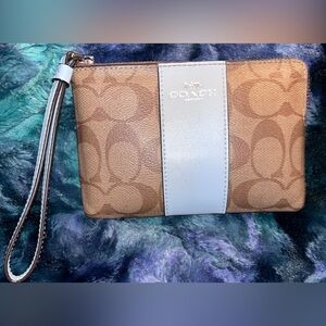Coach Brown Signature Canvas Wristlet with Light Blue Center Stripe